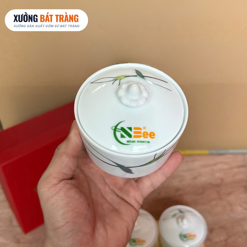Bộ 4 hũ mứt quà tặng in logo dáng tròn màu trắng hoạ tiết lá trúc XBT-KM02 - Ảnh 5